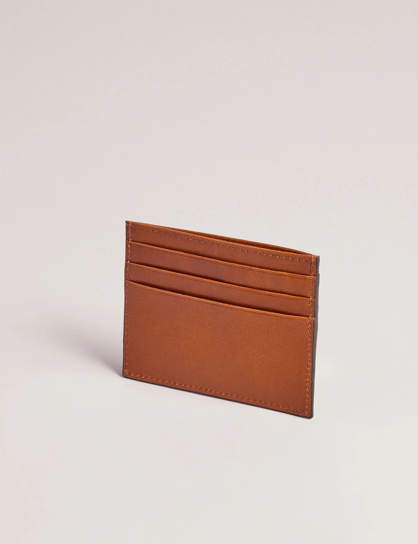 RAFFLE | TAN