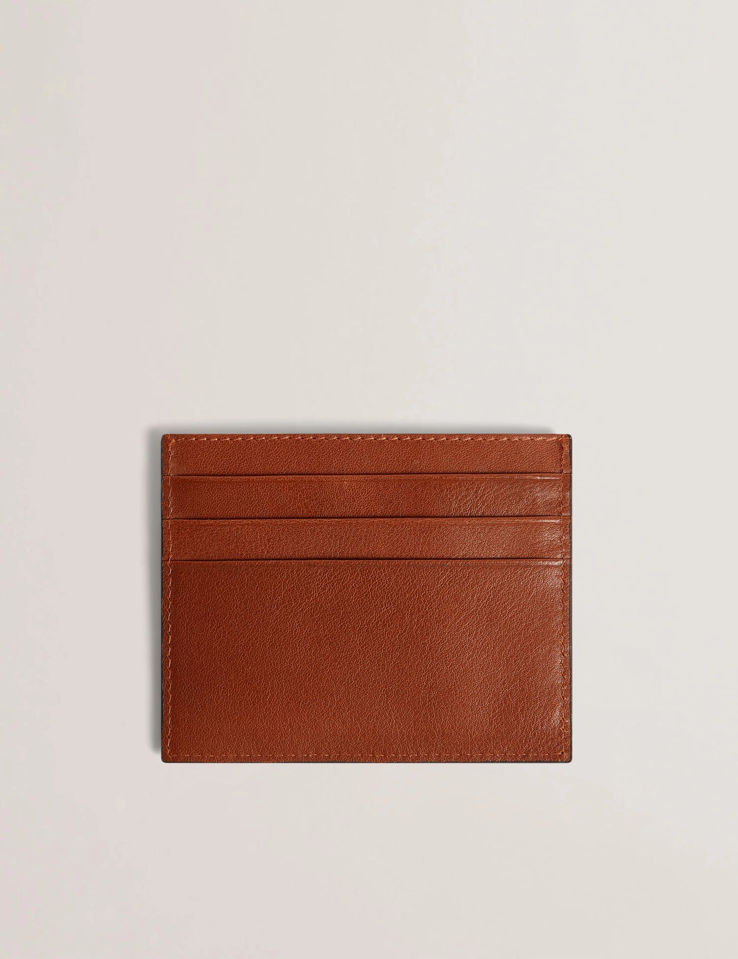 RAFFLE | TAN